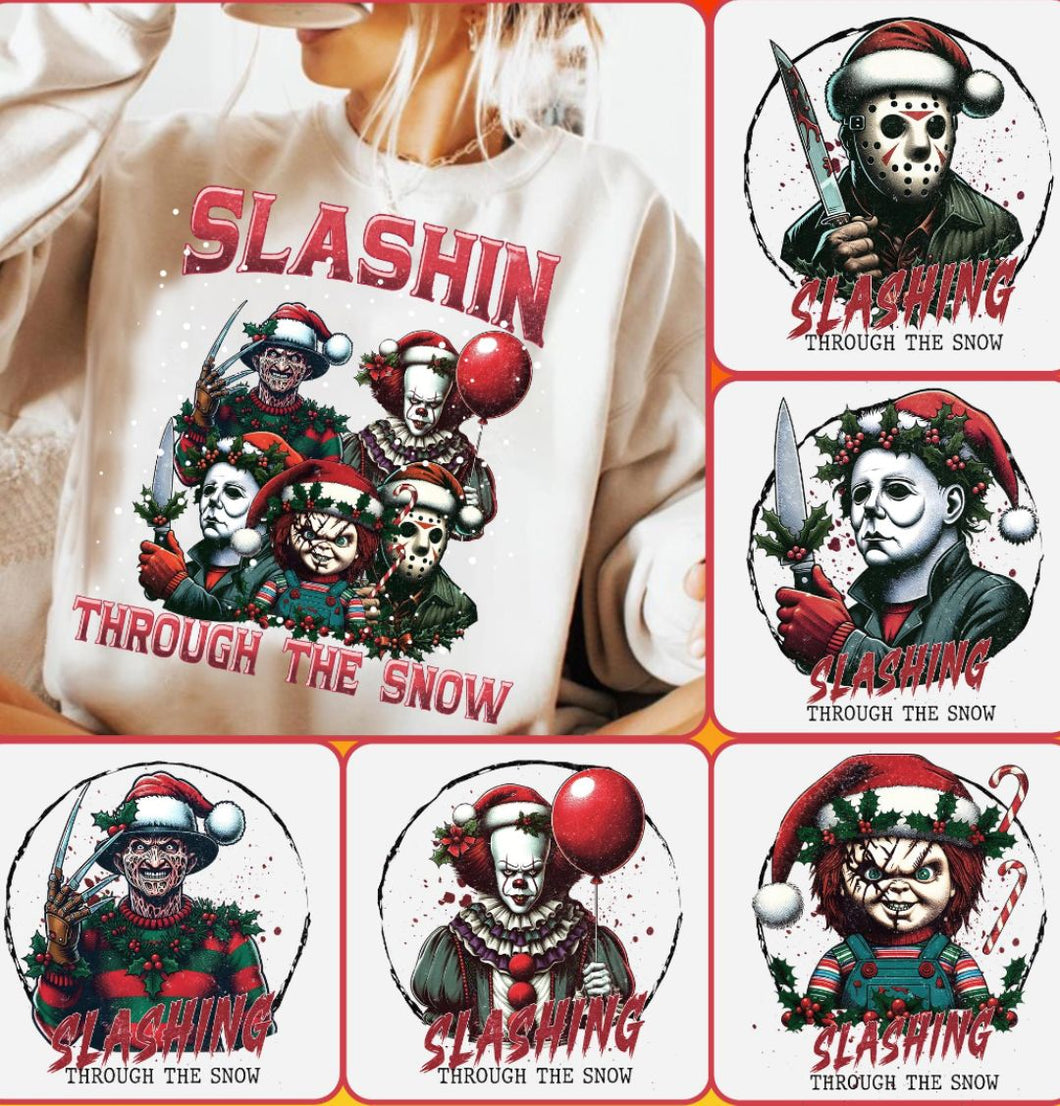 **PLEASE INDICATE IN NOTE SECTION WHICH  HORROR CHARACTER YOU WANT- JASON, MICHAEL , FREDDY, PENNYWISE, CHUCKY OR THE WHOLE GROUP** **Slashing Through the Snow Horror Christmas ***These will be made on a GRAY shirt***